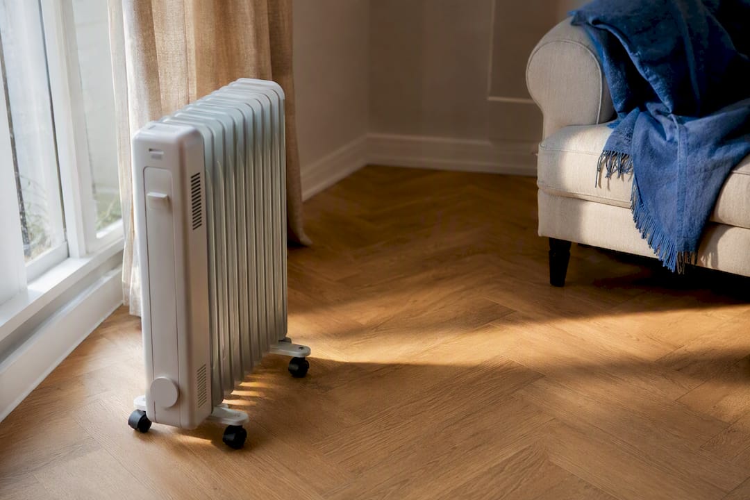 Radiator positioned clear of curtains and furniture
